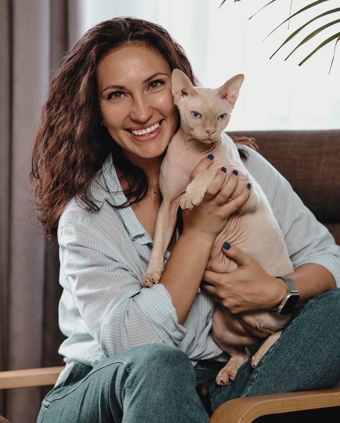 Cat sitter with dog from Cherry Hill’s Go-To Dog Walkers & Pet Sitters Since 2009